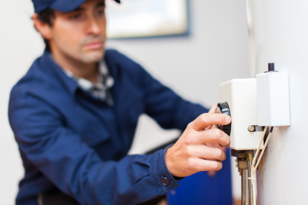 Electrician repairing a home's electrical issues