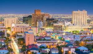 El Paso, Texas, USA downtown city skyline at dusk with Juarez, Mexico in the distance.